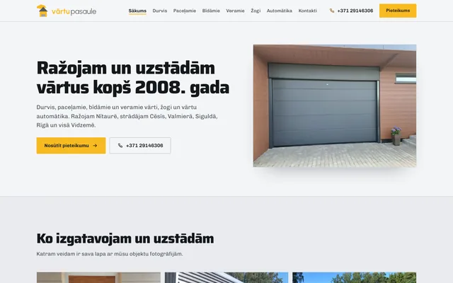 Vārtu pasaule — homepage on a laptop